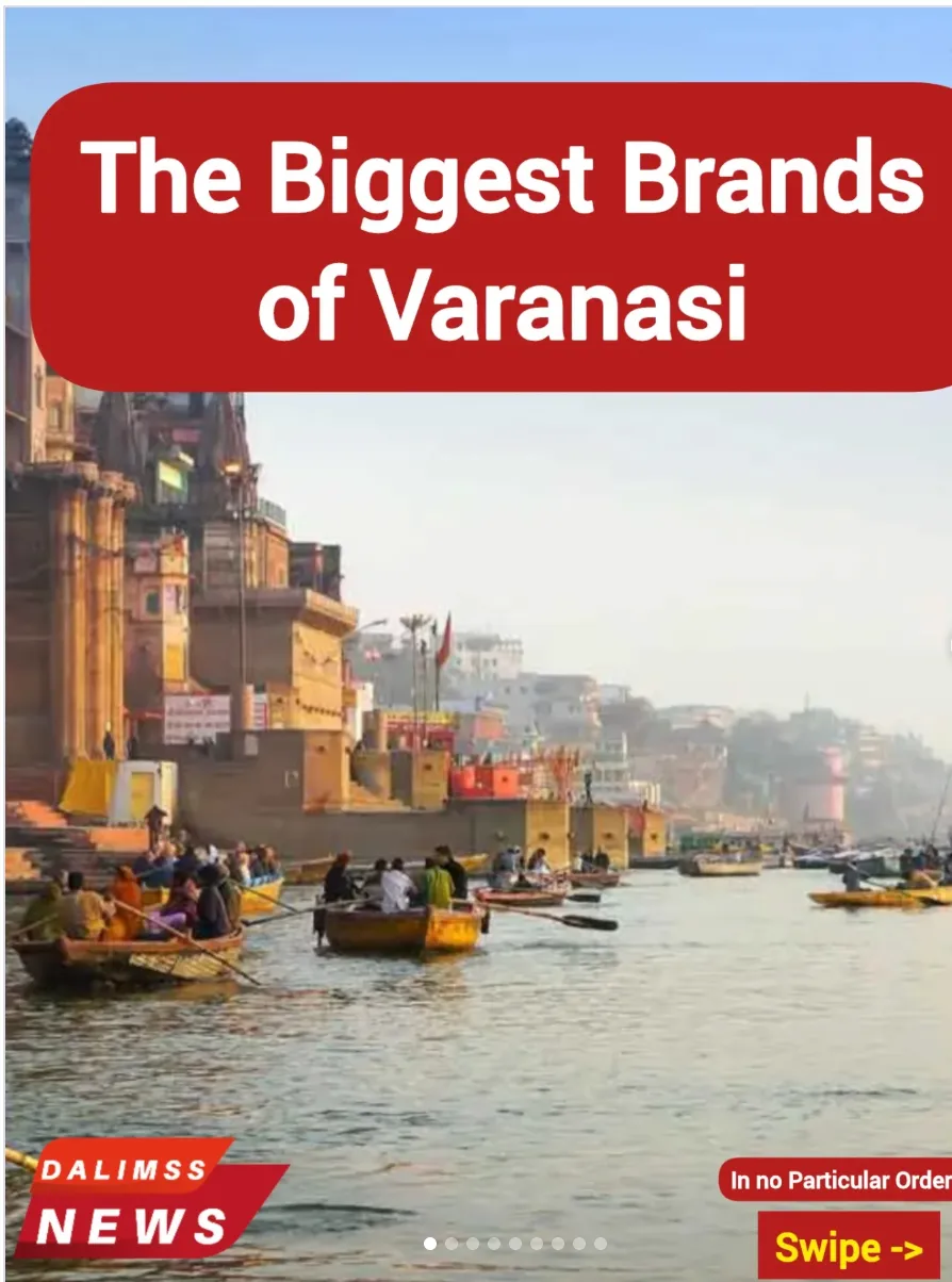 Rowing boats with passengers on the river beside riverside ghat buildings, under the title The Biggest Brands of Varanasi.