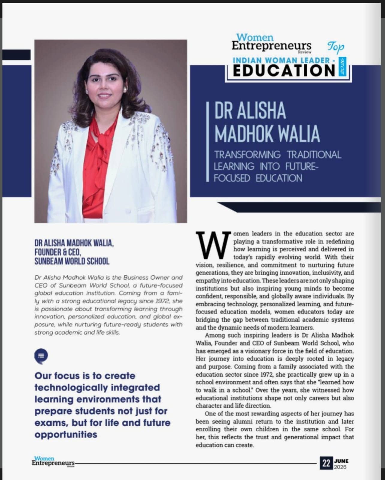 Magazine page with a portrait of a smiling woman in a white embellished blazer and red blouse beside profile text.