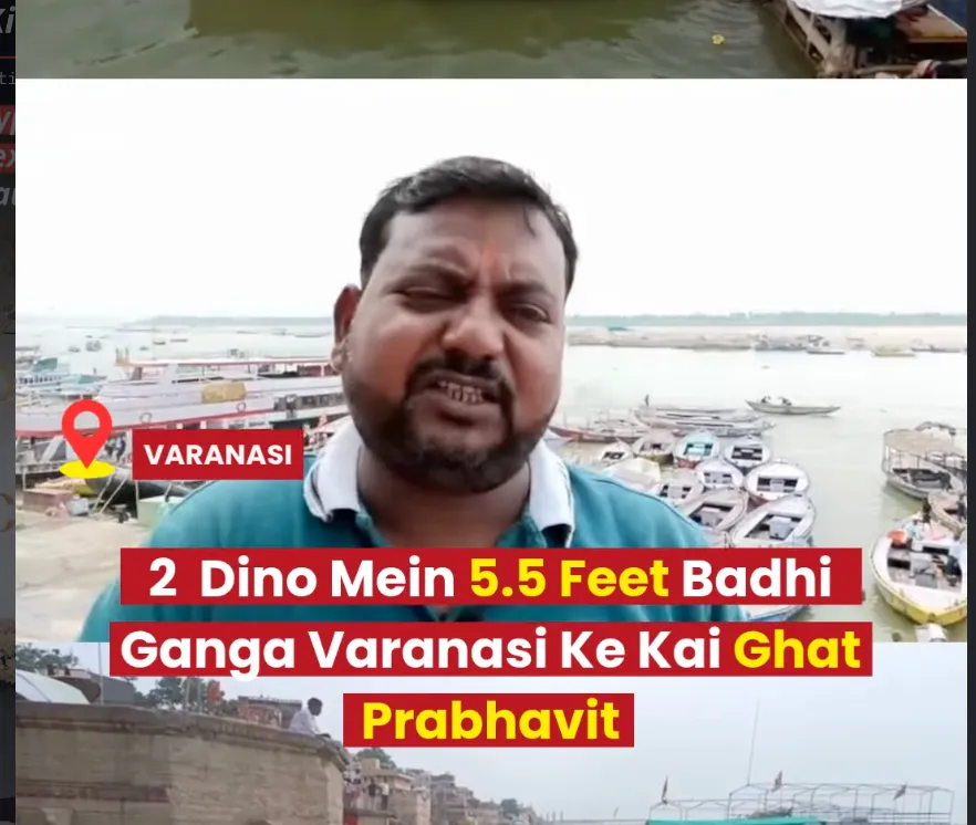 Varanasi boatmen securing their boats against the rising stone steps of a partially submerged ghat as the Ganga river swells due to upstream dam release