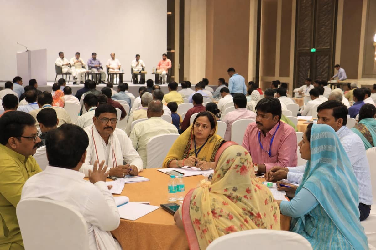 Rural elected representatives attending a policy conference at a modern convention centre in Varanasi