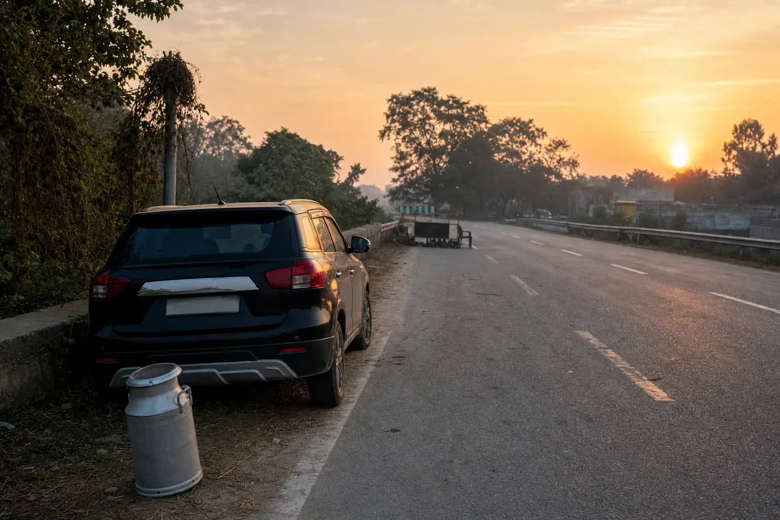Representative image of a black SUV and milk can beside a road near Varanasi