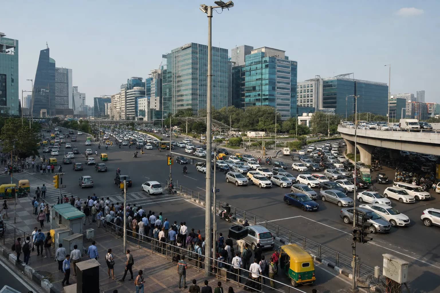 Busy Shankar Chowk traffic corridor in Gurugram near modern office towers
