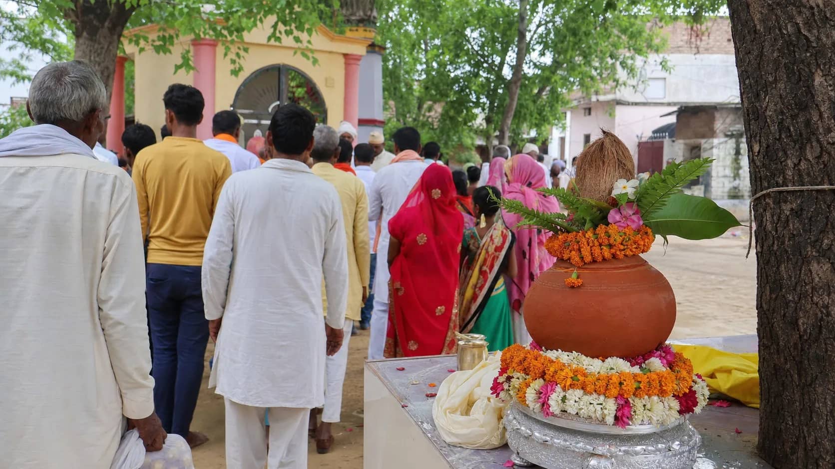 Ceremonial earthen kalash arranged near Sant Ravidas birthplace in Varanasi without text or party logos