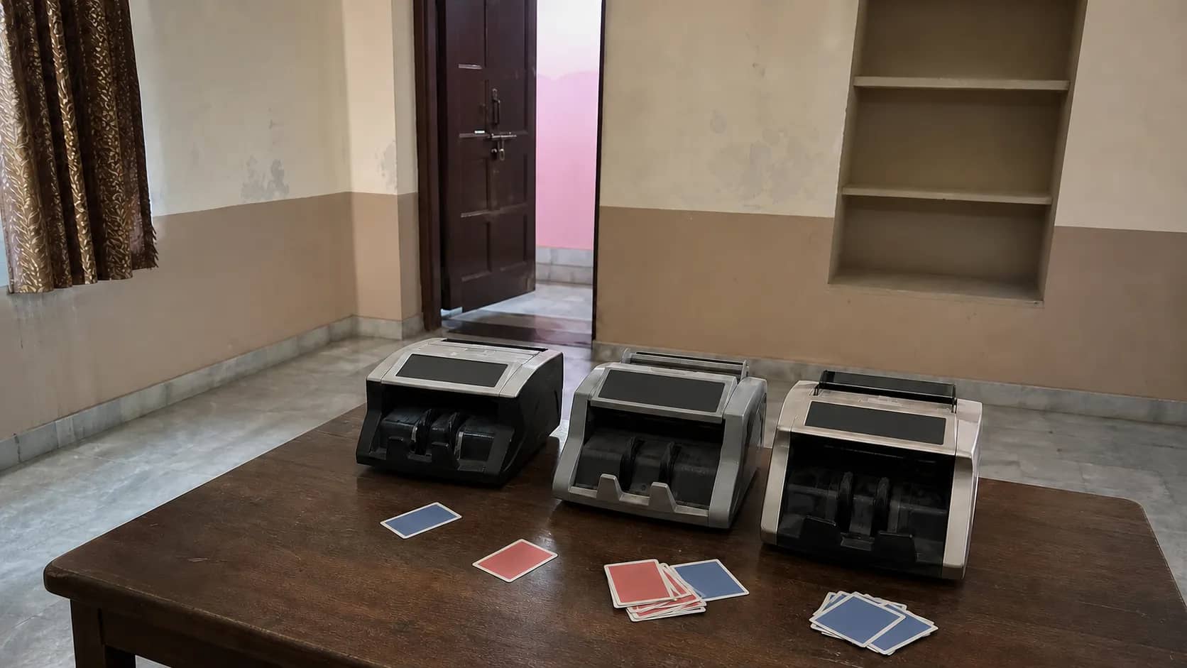 Prospective students carrying documents outside a BHU admissions building in Varanasi