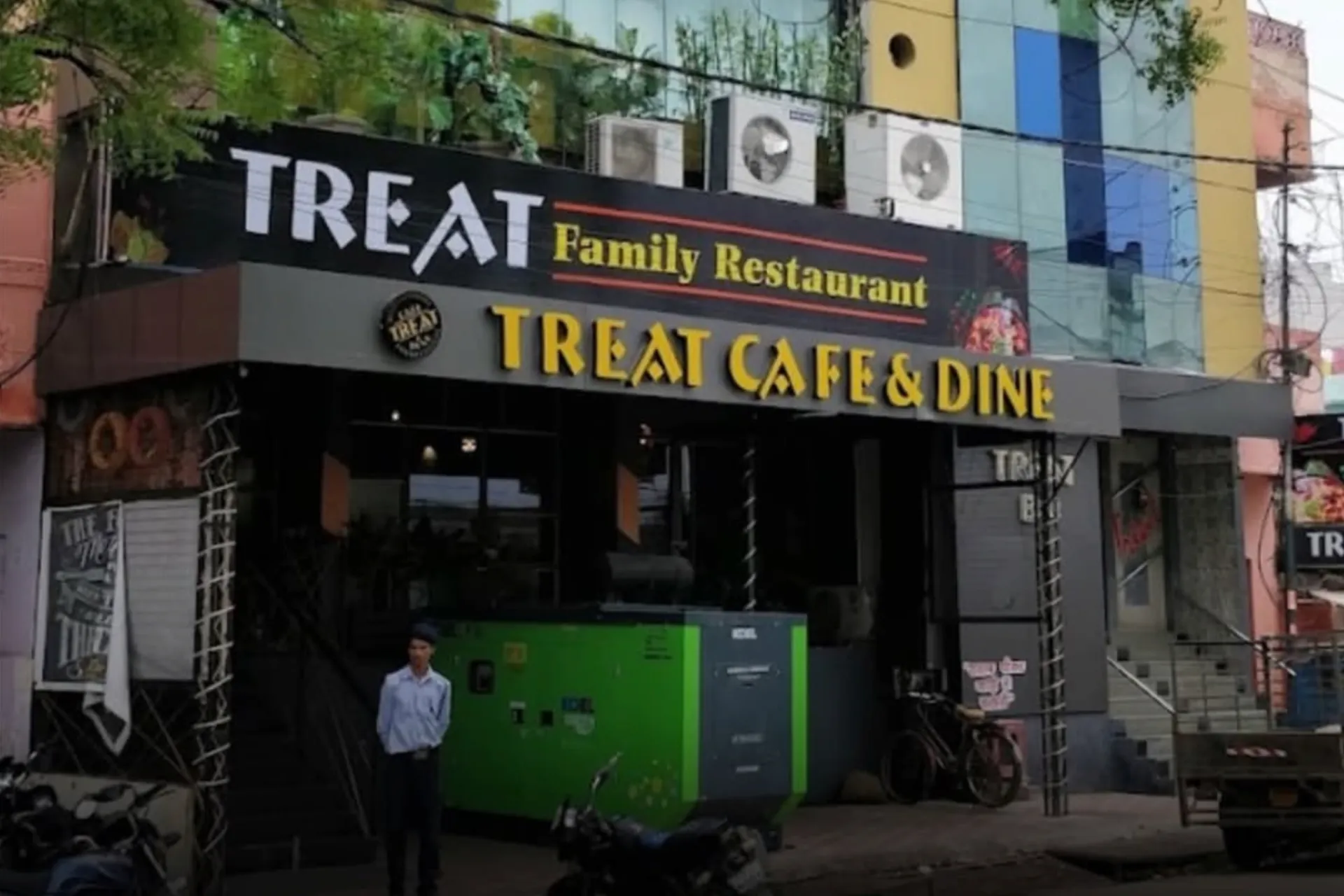 Exterior of Treat Family Restaurant and Treat Cafe & Dine near Varuna Bridge in Varanasi, where the bar manager assault and alleged extortion case was reported.