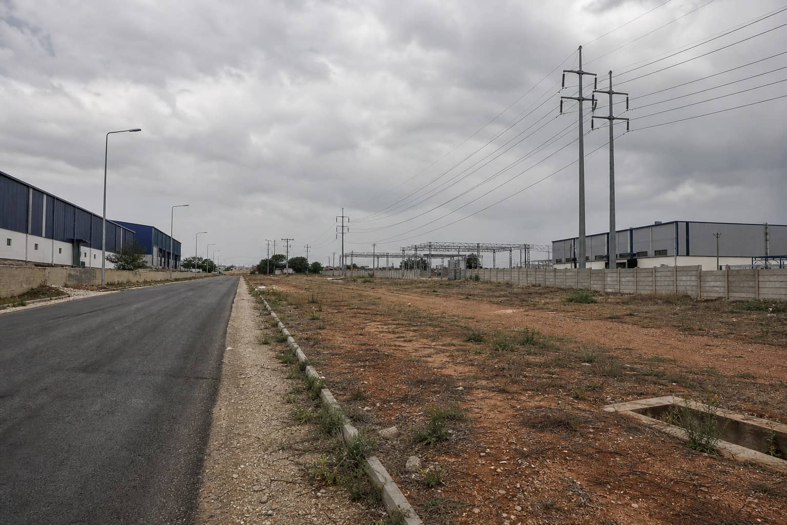 Industrial shed cluster and power infrastructure corridor along Bilaspur-Tauru Road near Gurugram