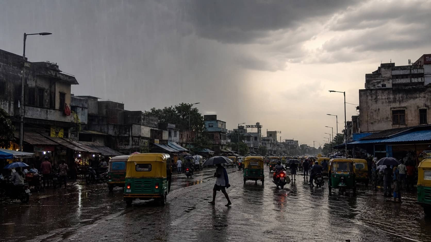 Rain falling on a Varanasi street with shallow waterlogging