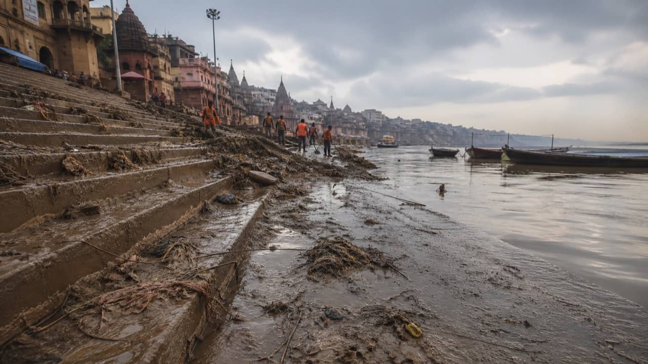 Muddy steps appearing as floodwater recedes from a Varanasi ghat
