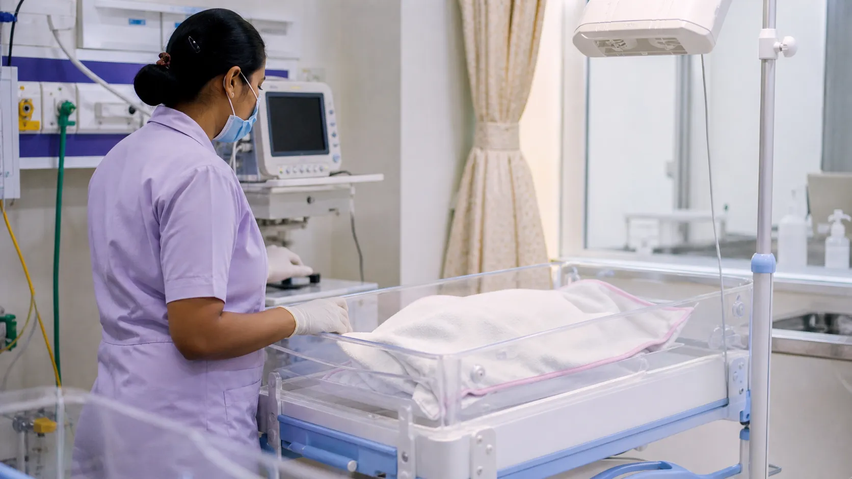 Hospital bassinet prepared for a rescued newborn in Varanasi