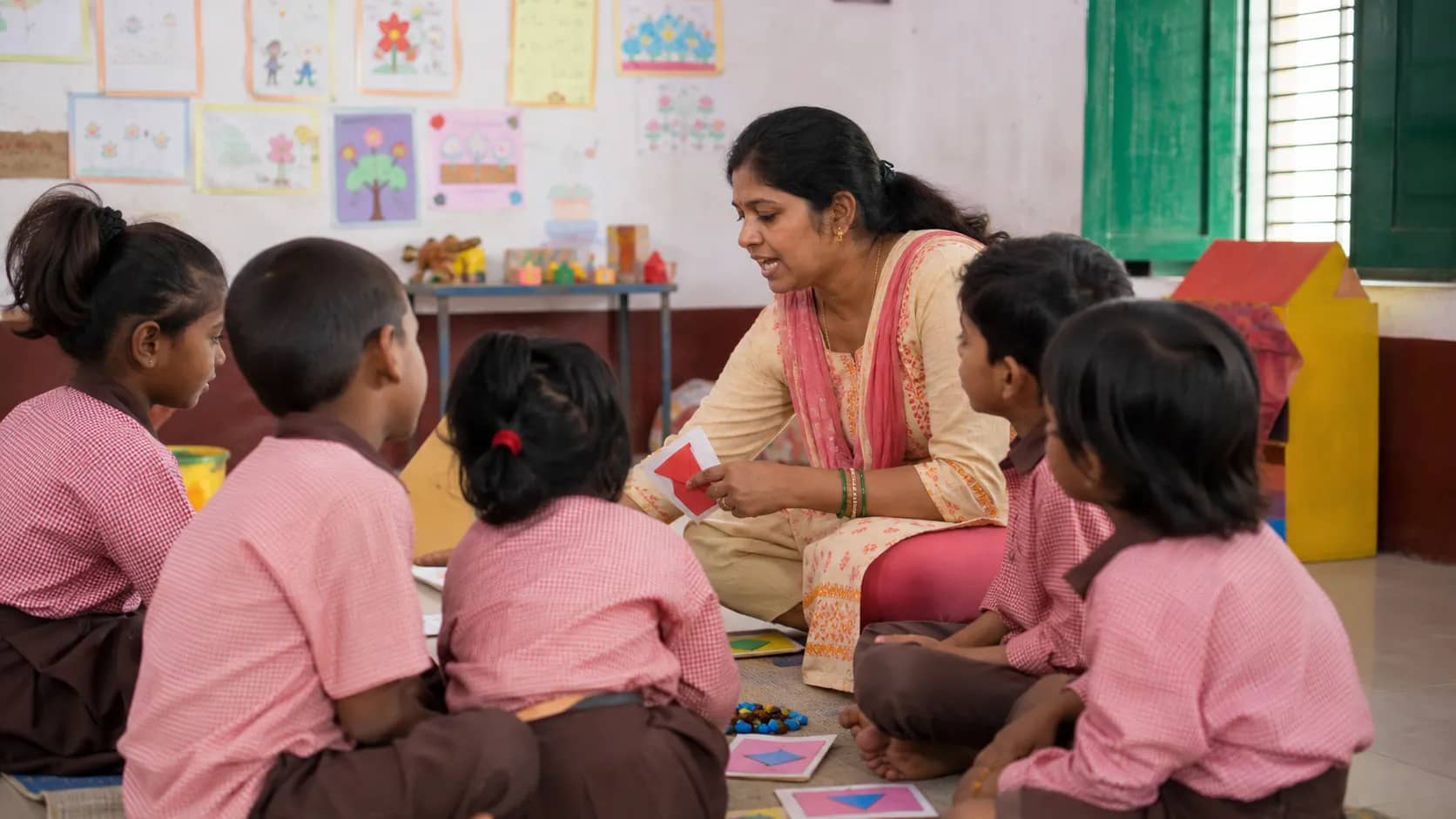 Primary teacher using activity-based learning in a Varanasi classroom