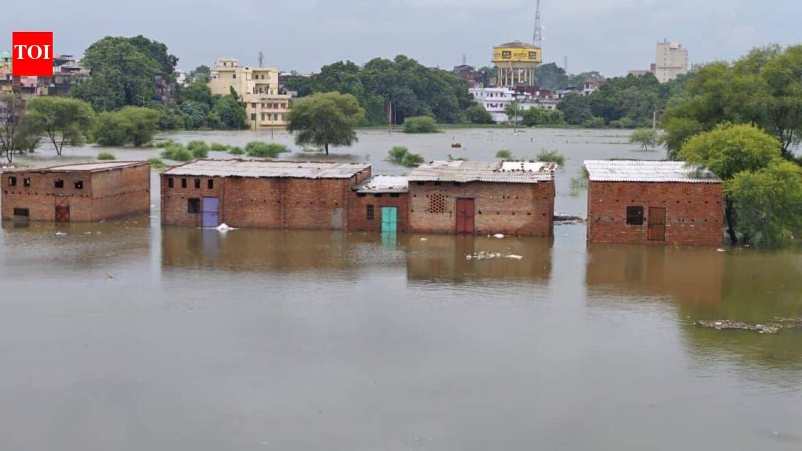Flooded Varanasi ghat steps and riverside lanes beside the swollen Ganga