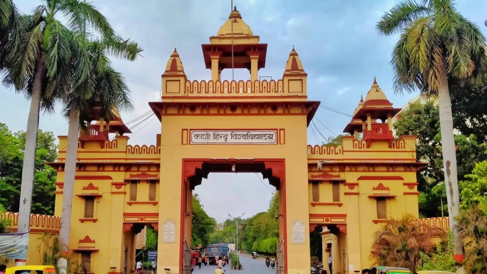 BHU administrative building and a police case file shown without identifying individuals
