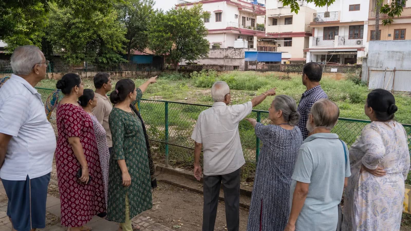 Residents marching through a Varanasi neighbourhood to protect park land