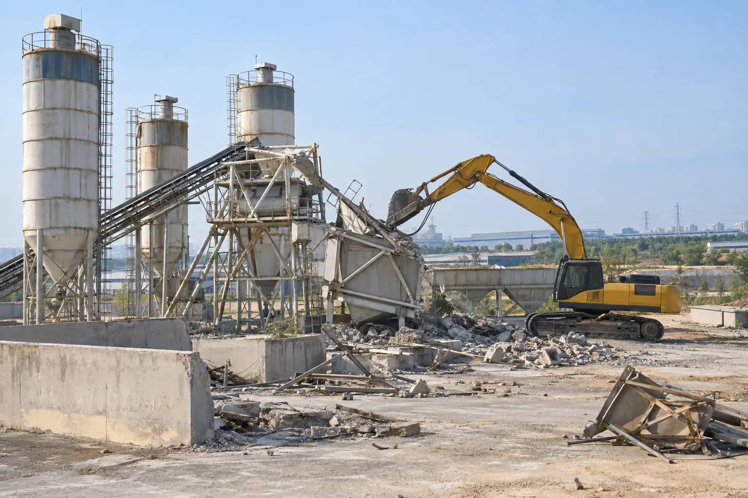 Heavy machinery clearing an unauthorised concrete batching site in Manesar