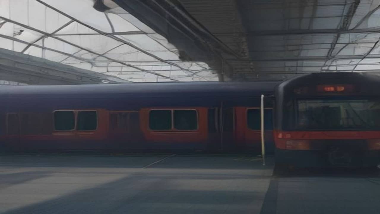 Empty long-distance train coaches on a platform under soft morning light, no readable train boards, no people, no logos or text