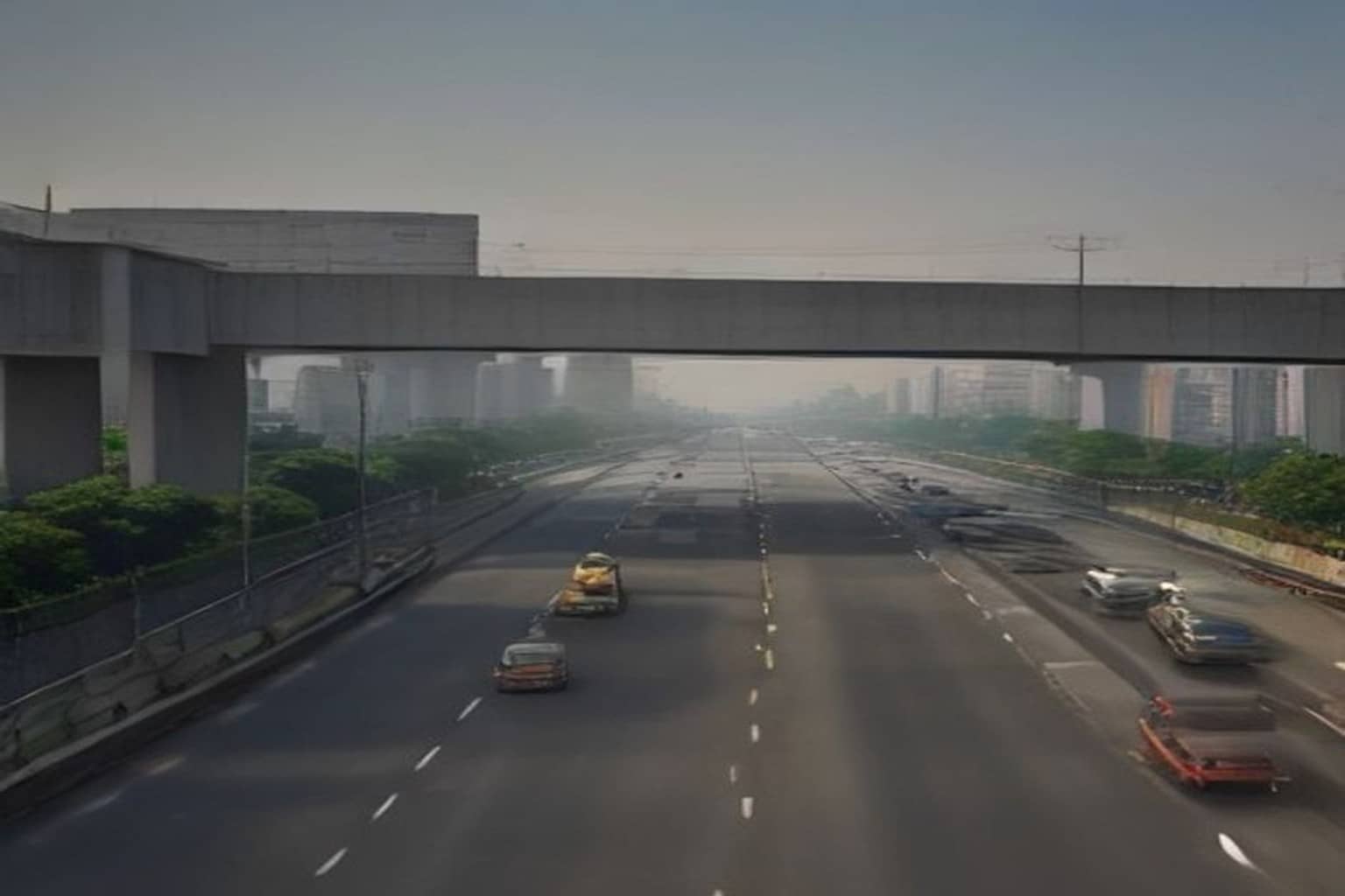 A wide multi-lane Gurugram highway runs under a concrete elevated overpass with distant high-rises faded in heavy haze and a few vehicles on the asphalt.