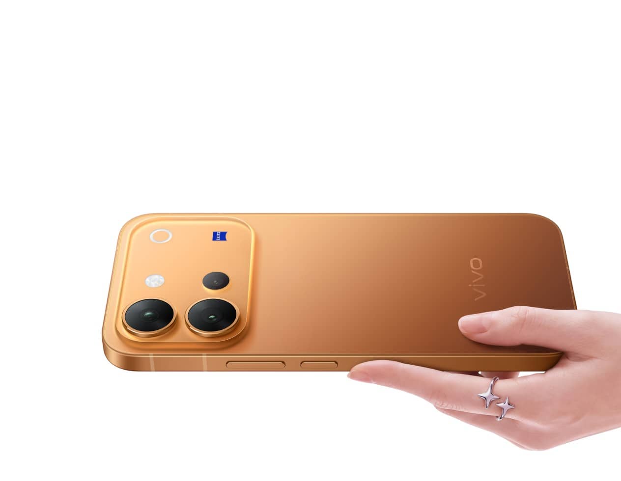 vivo V80 in an orange finish held flat in one hand, showing its square rear camera module