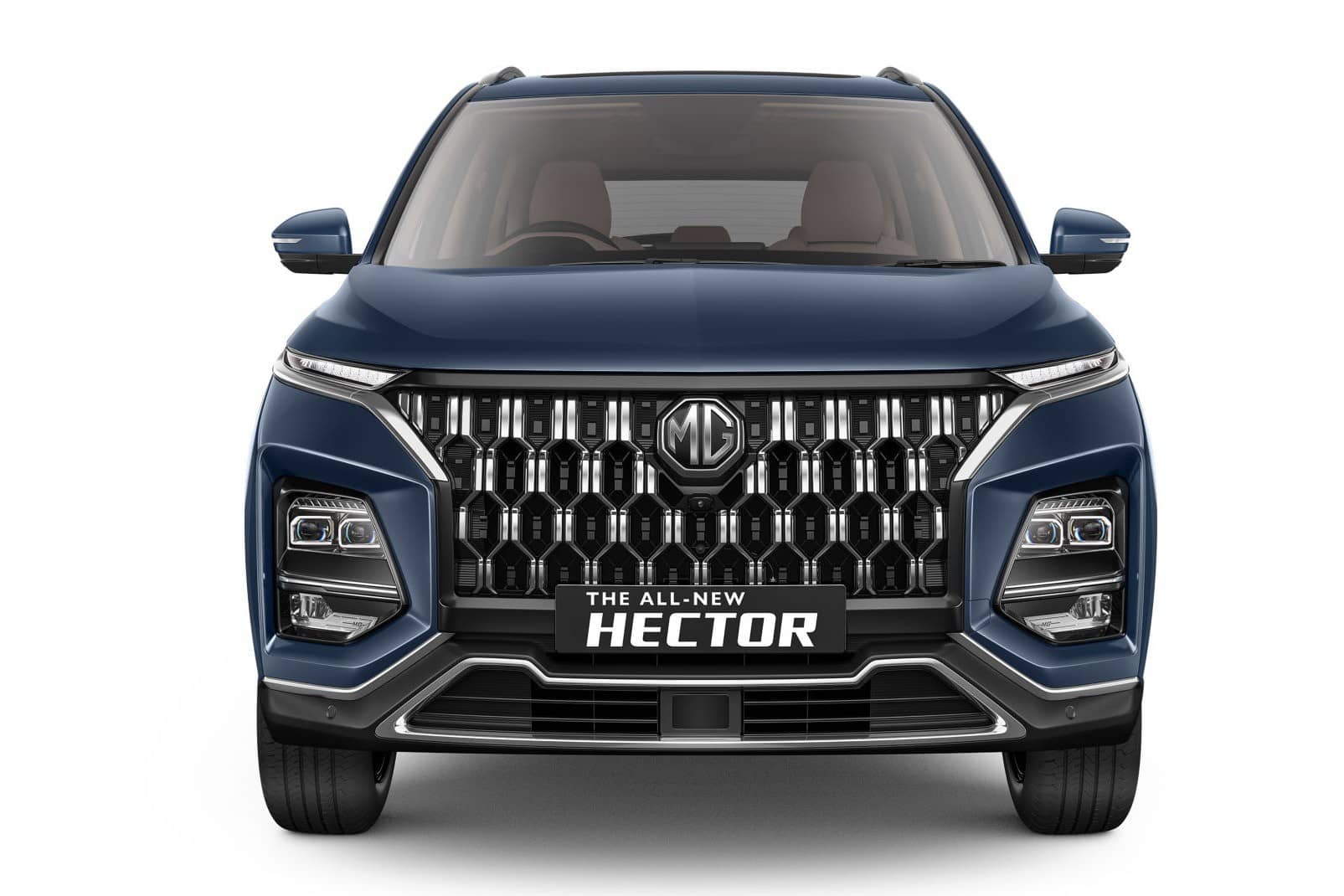 Dark blue MG Hector SUV seen head-on, showing its large chrome-studded grille and slim LED lamps on a white background