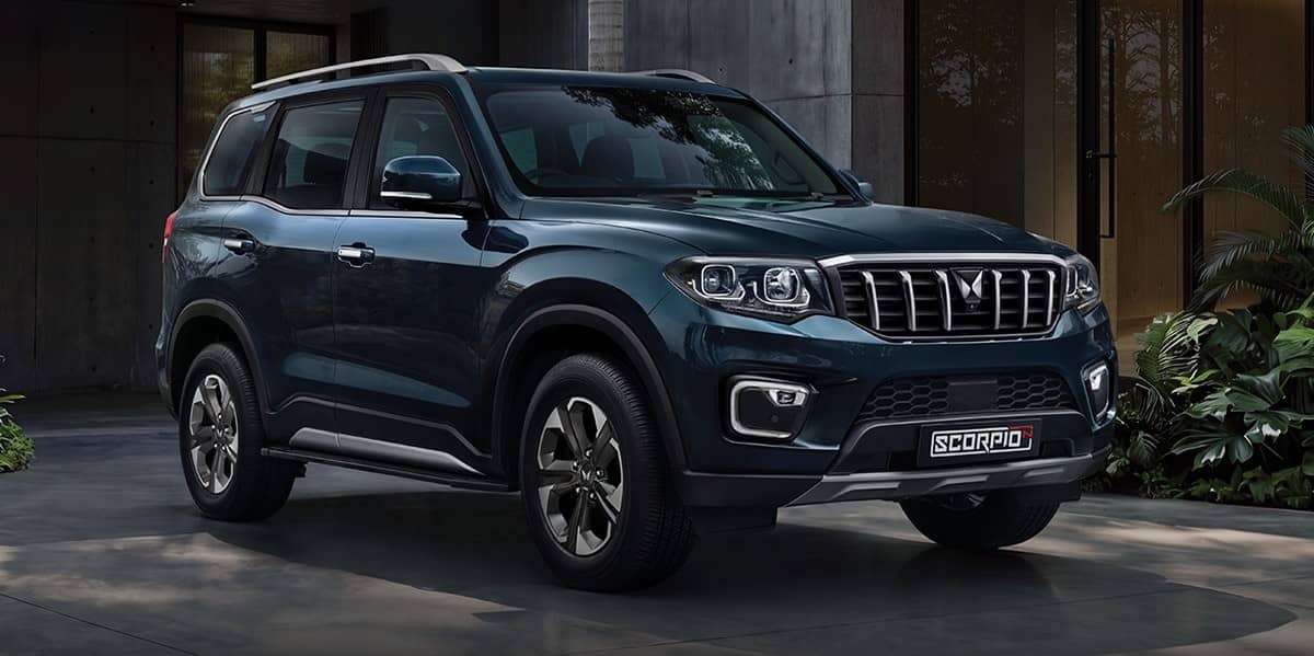 Dark blue Mahindra Scorpio-N SUV seen from the front three-quarter angle
