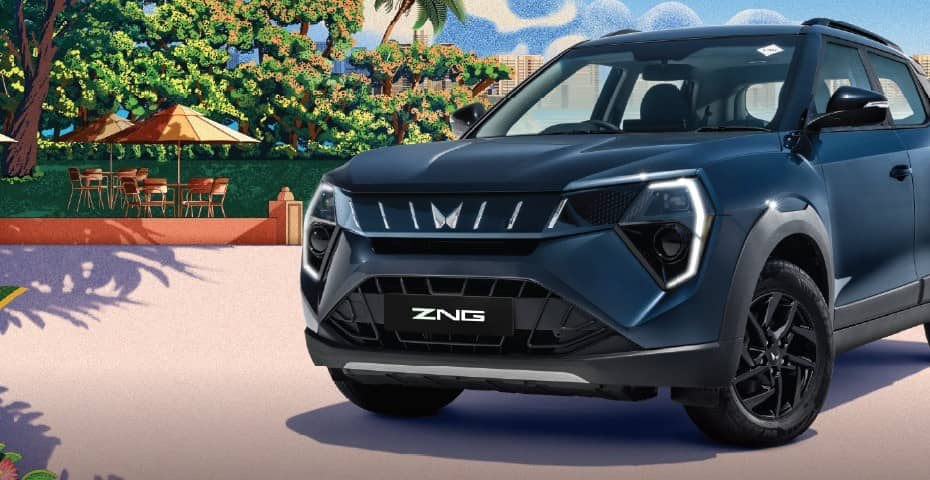 Blue Mahindra XUV 3XO ZNG parked on a seaside promenade