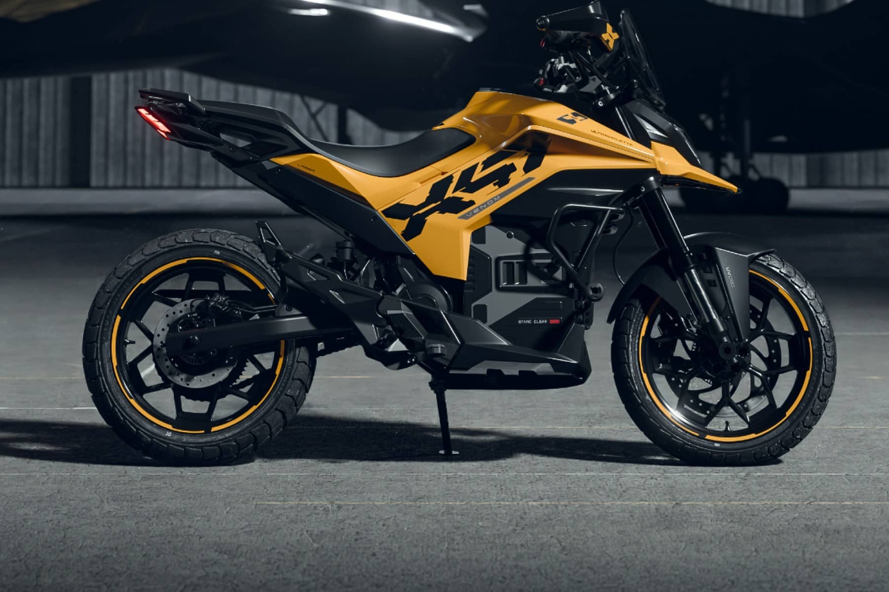 Ultraviolette X-47 Venom electric motorcycle in a studio side view