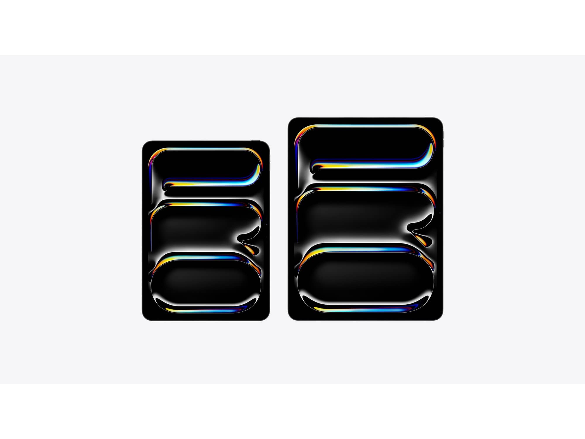 Two iPad Pro tablets of different sizes shown front-on, their dark screens lit with colourful light trails
