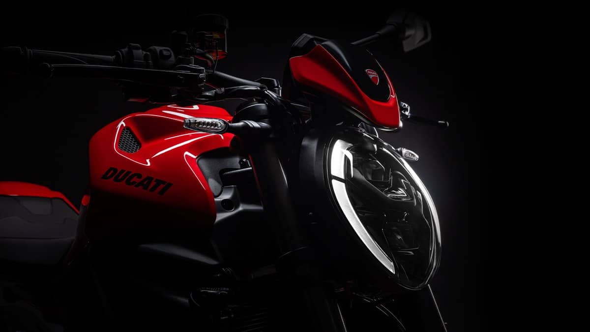 Ducati Monster naked motorcycle in the official landscape model hero image