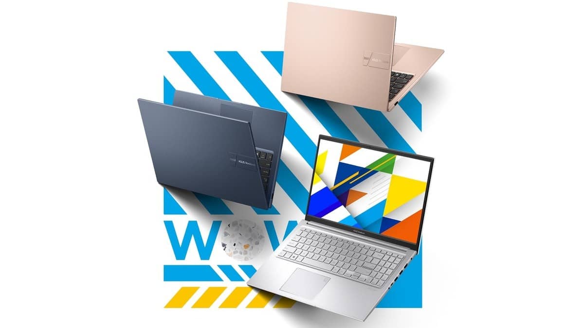 ASUS Vivobook 15 family hero showing an open silver laptop and blue and terracotta lids