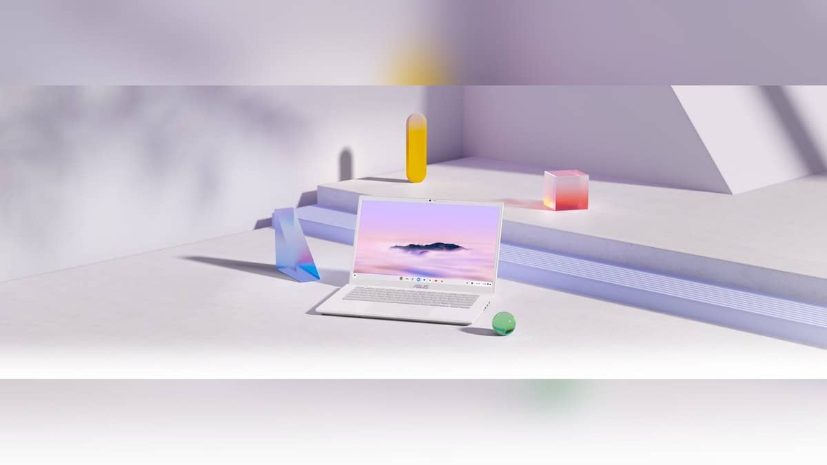 Landscape official image of an open ASUS Chromebook Plus CX34 among geometric display blocks