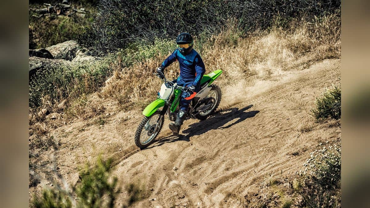 Kawasaki KLX140F in an official outdoor riding photograph